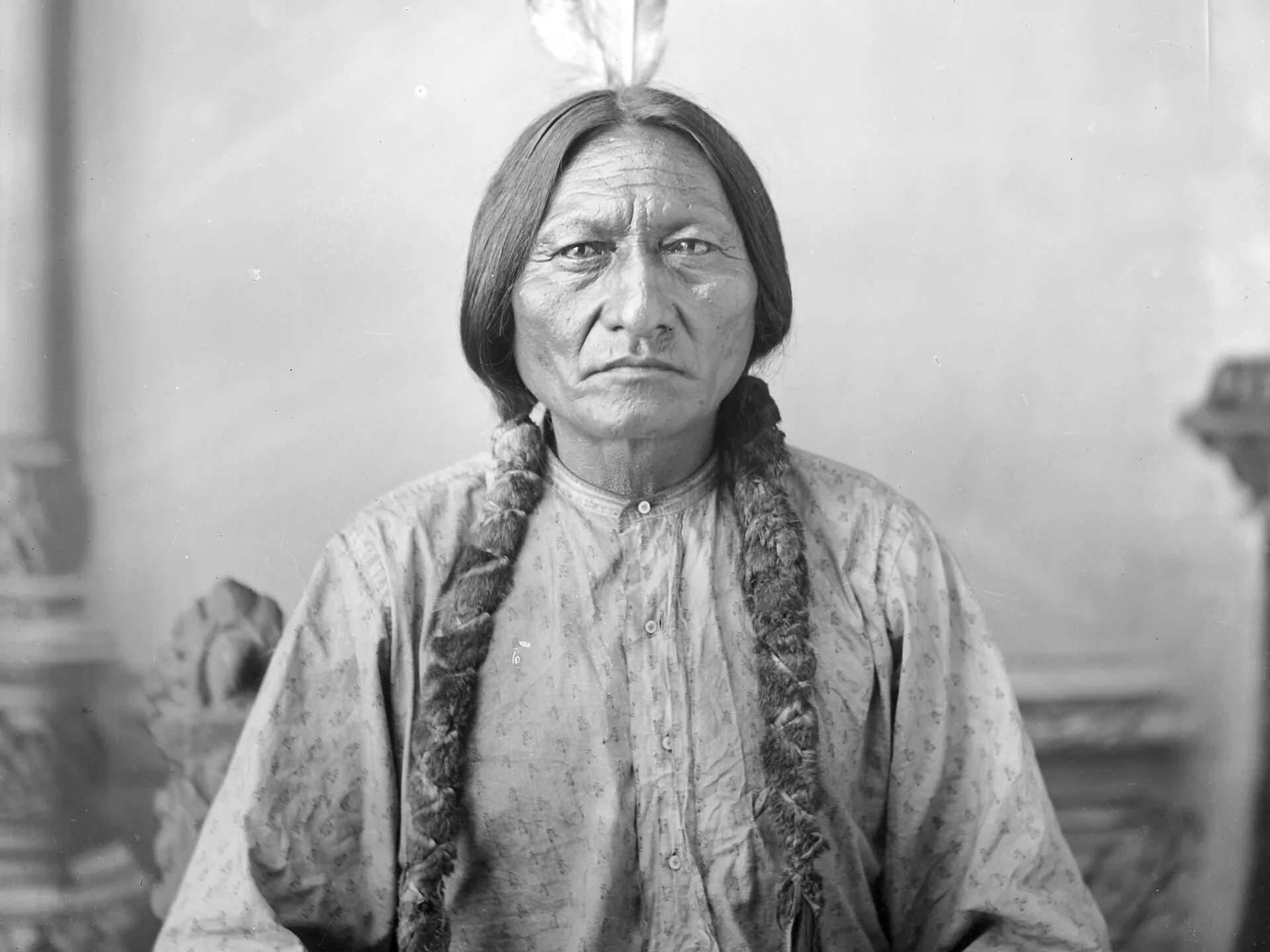 Studio portrait of Sitting Bull, Hunkpapa Lakota leader, seated