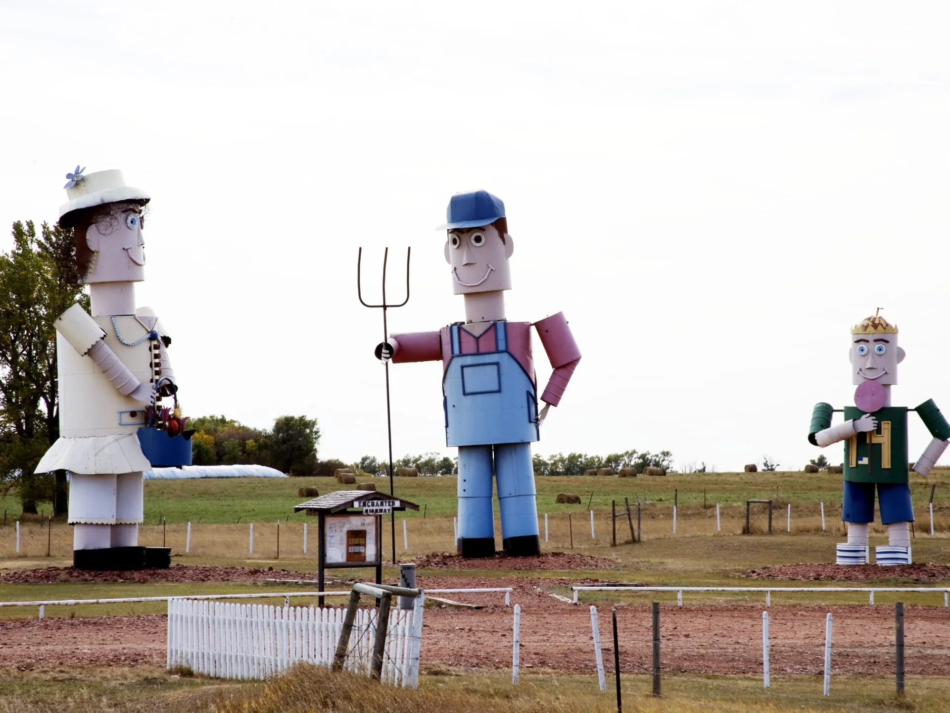 The Tin Family, the first of Gary Greff’s scrap metal sculptures, standing in a field on the Enchanted Highway