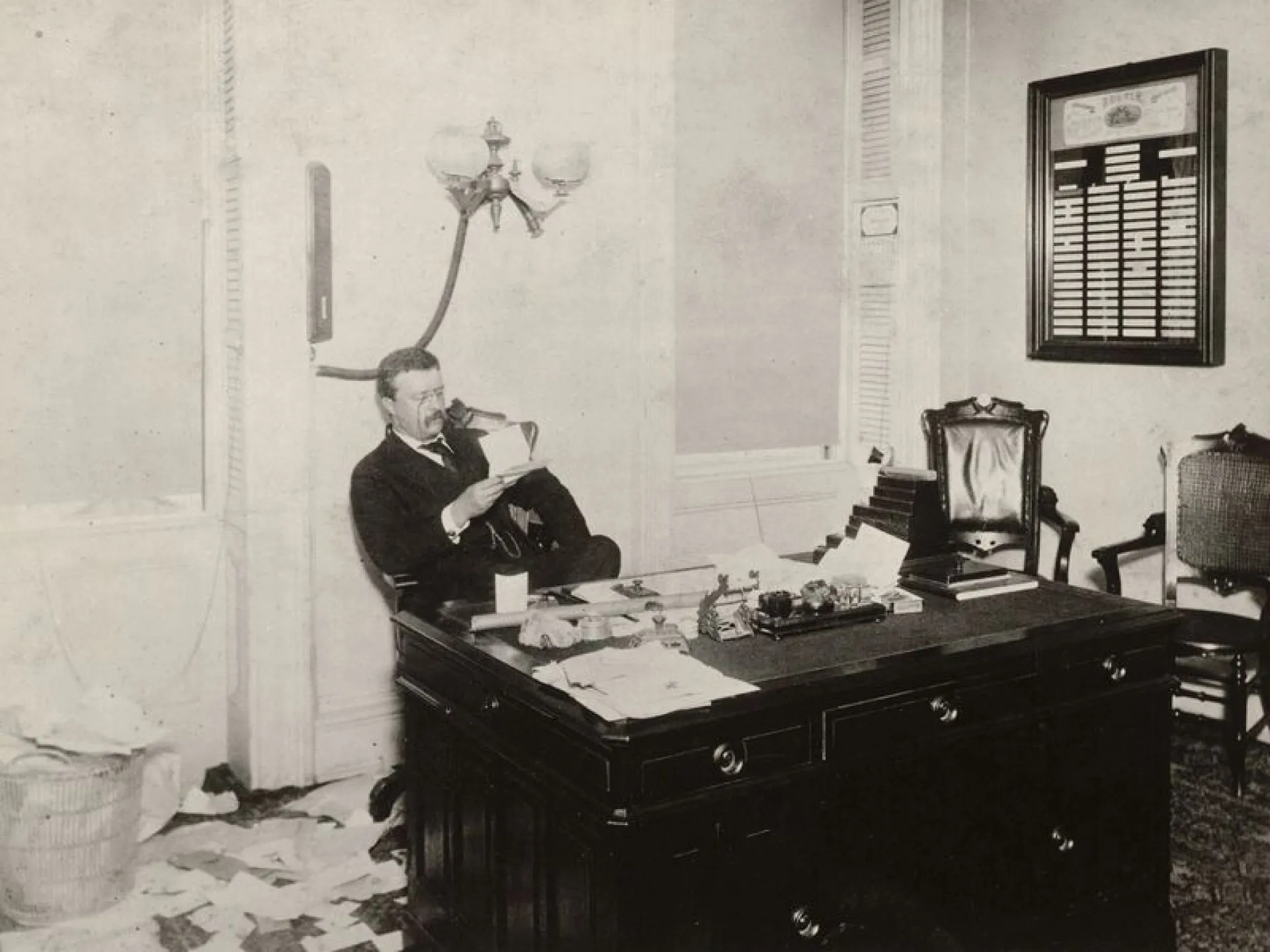 Theodore Roosevelt at his desk as New York City Police Commissioner