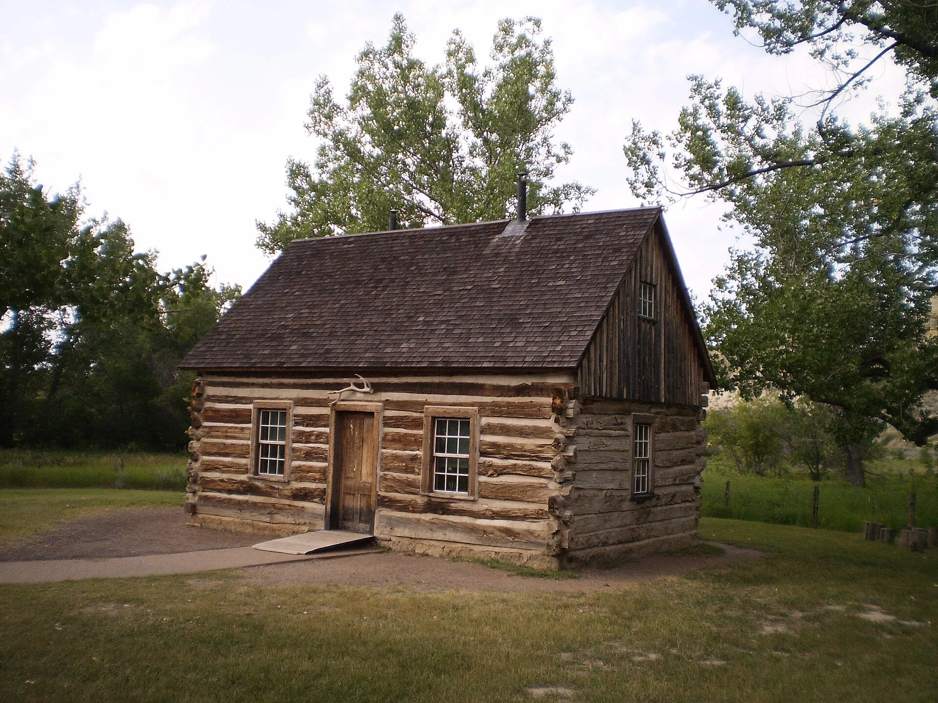 Theodore Roosevelt's Maltese Cross Cabin in summer