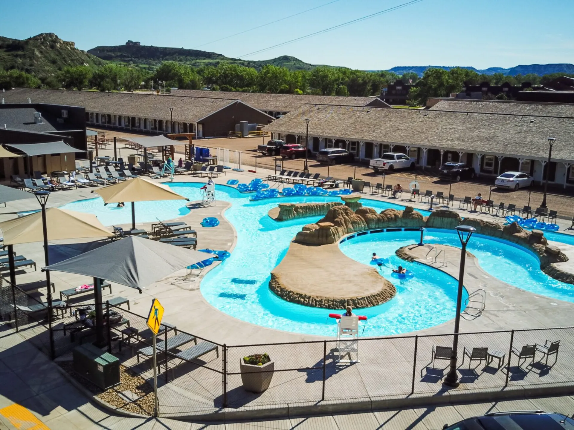 Aerial view of the Point to Point Park lazy river pool below the buttes