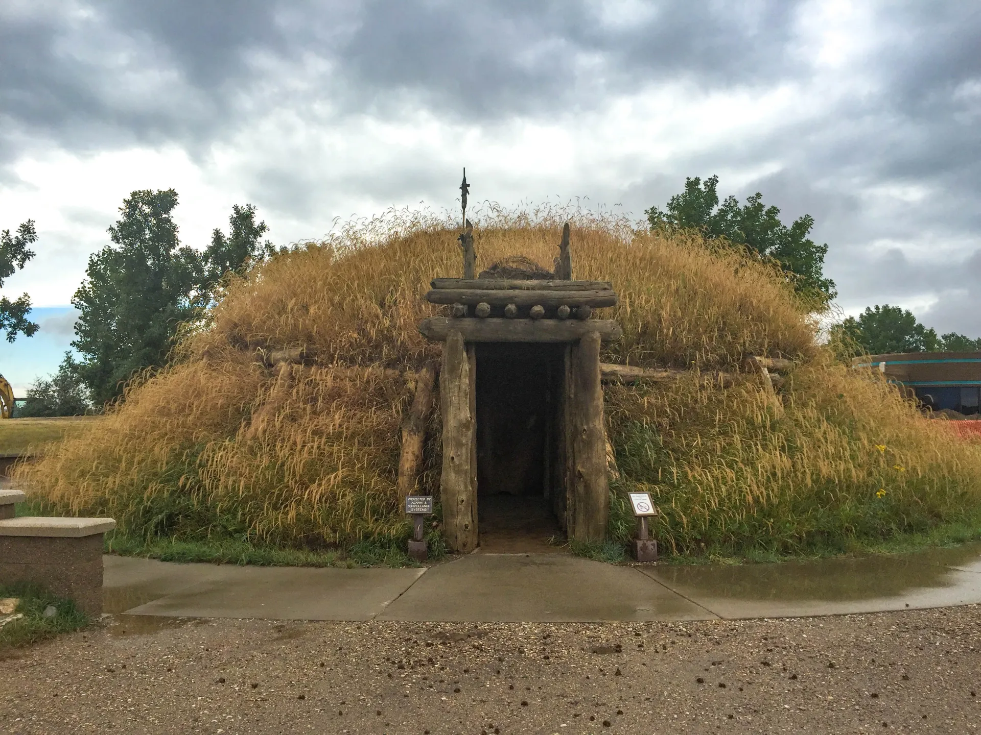A grass-covered reconstructed earthlodge at Knife River Indian Villages