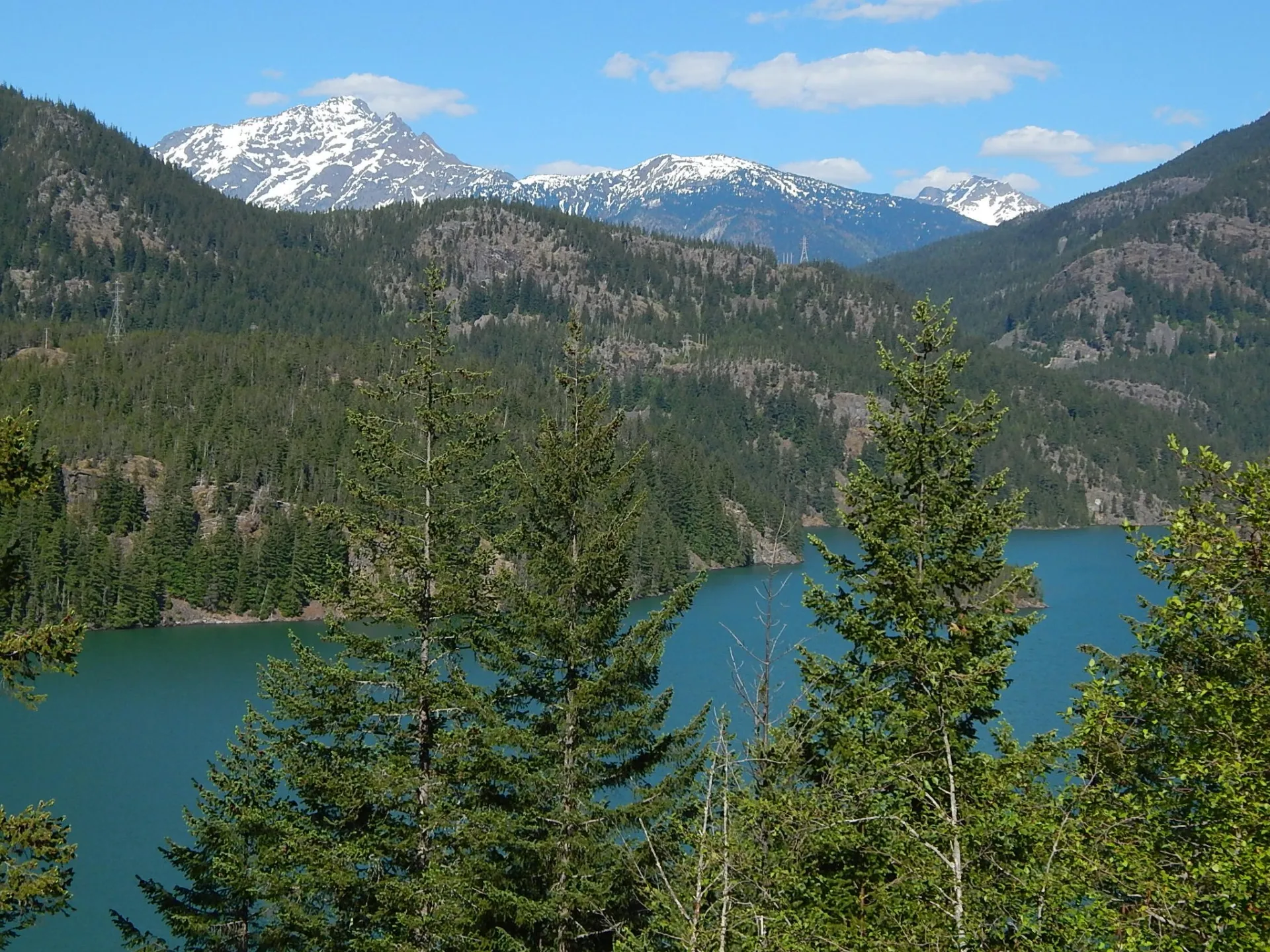Turquoise Diablo Lake below snowy Jack Mountain in the North Cascades