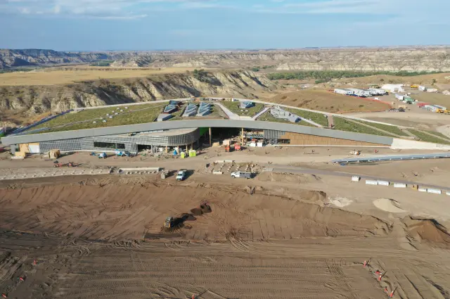Aerial view of the Theodore Roosevelt Presidential Library with the raw beauty of the Badlands in the background