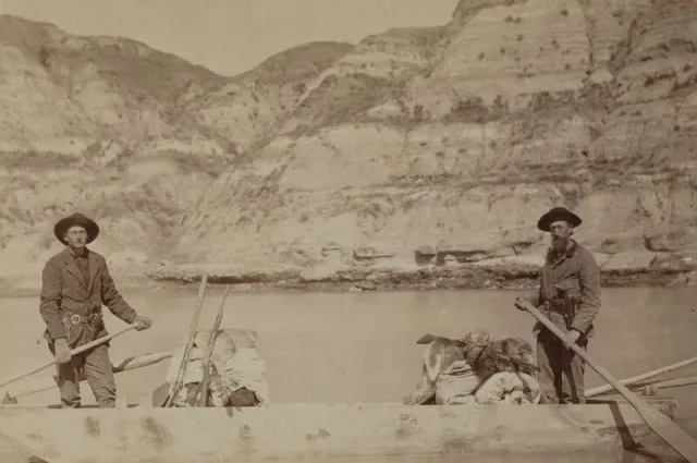 Bill Sewall and Wilmot Dow aboard the flat-bottomed boat on the Little Missouri