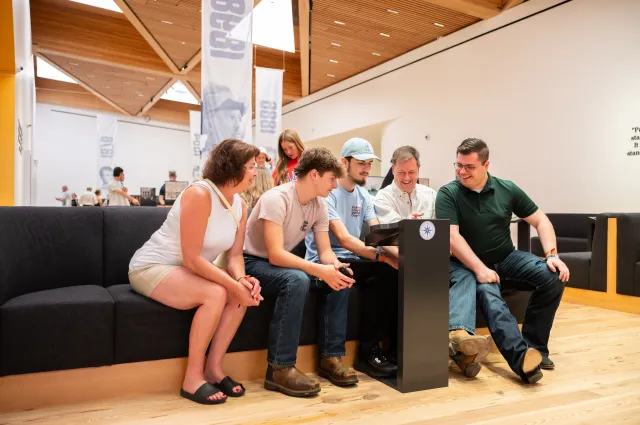 A group of participants enjoying a Trailblazer station in the Permanent Exhibit