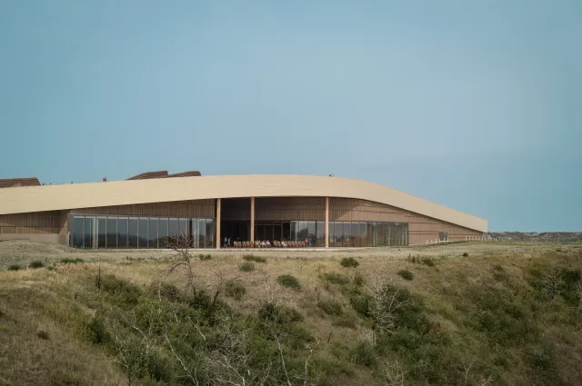 Aerial view of the Library low in the badlands landscape
