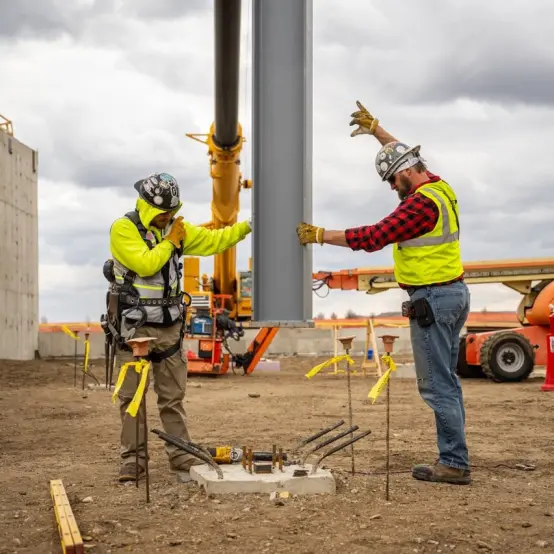 First Steel Beam Goes in Place