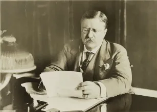 Theodore Roosevelt at his desk