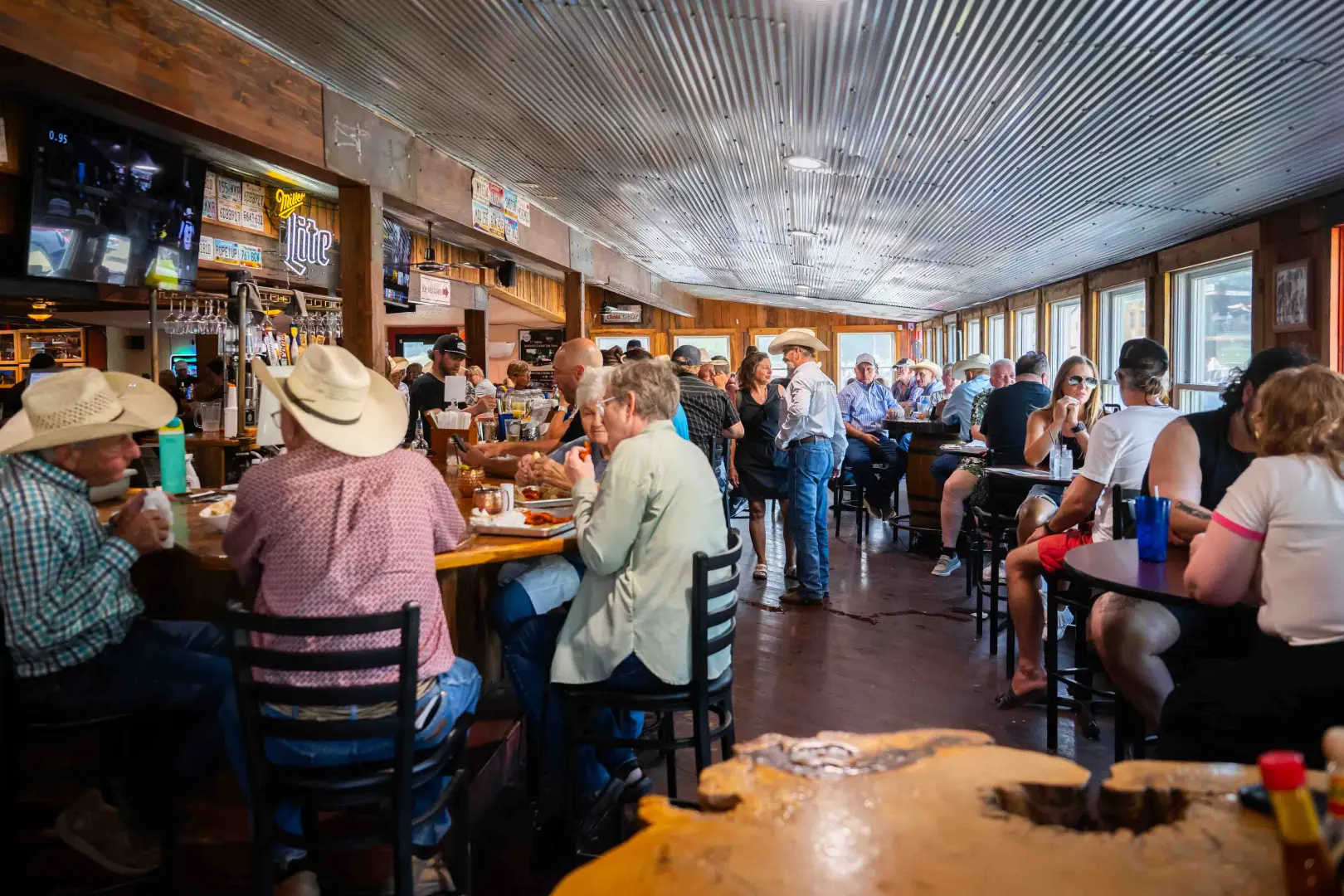 people sitting at a bar