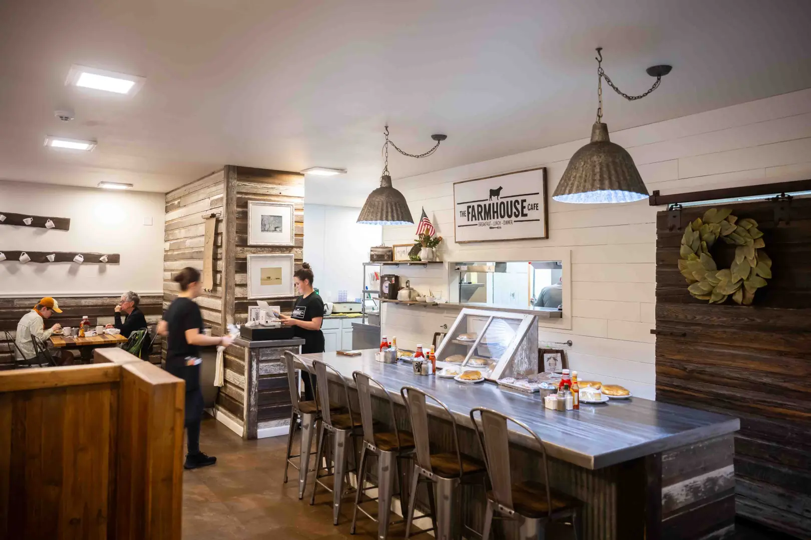 cafe server checking out customer