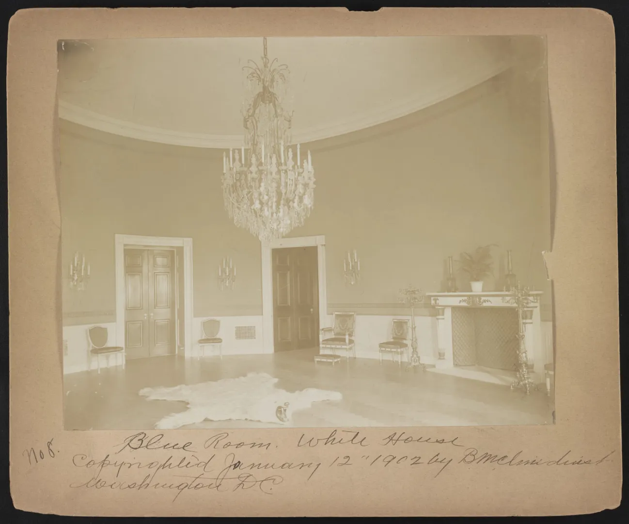 The oval Blue Room of the White House with chandelier and restored Federal-style furnishings, 1902