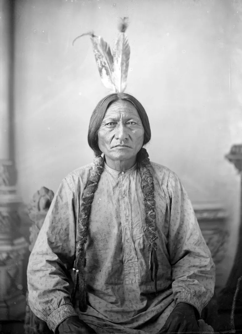 Studio portrait of Sitting Bull, Hunkpapa Lakota leader, seated