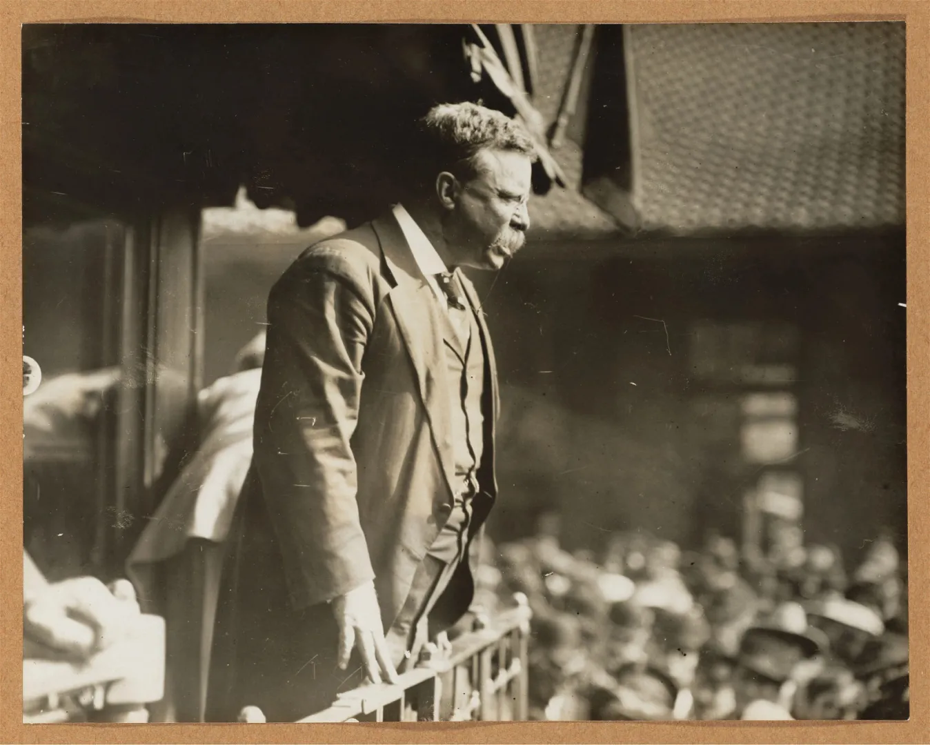 Theodore Roosevelt speaking from a platform with an emphatic gesture, 1910