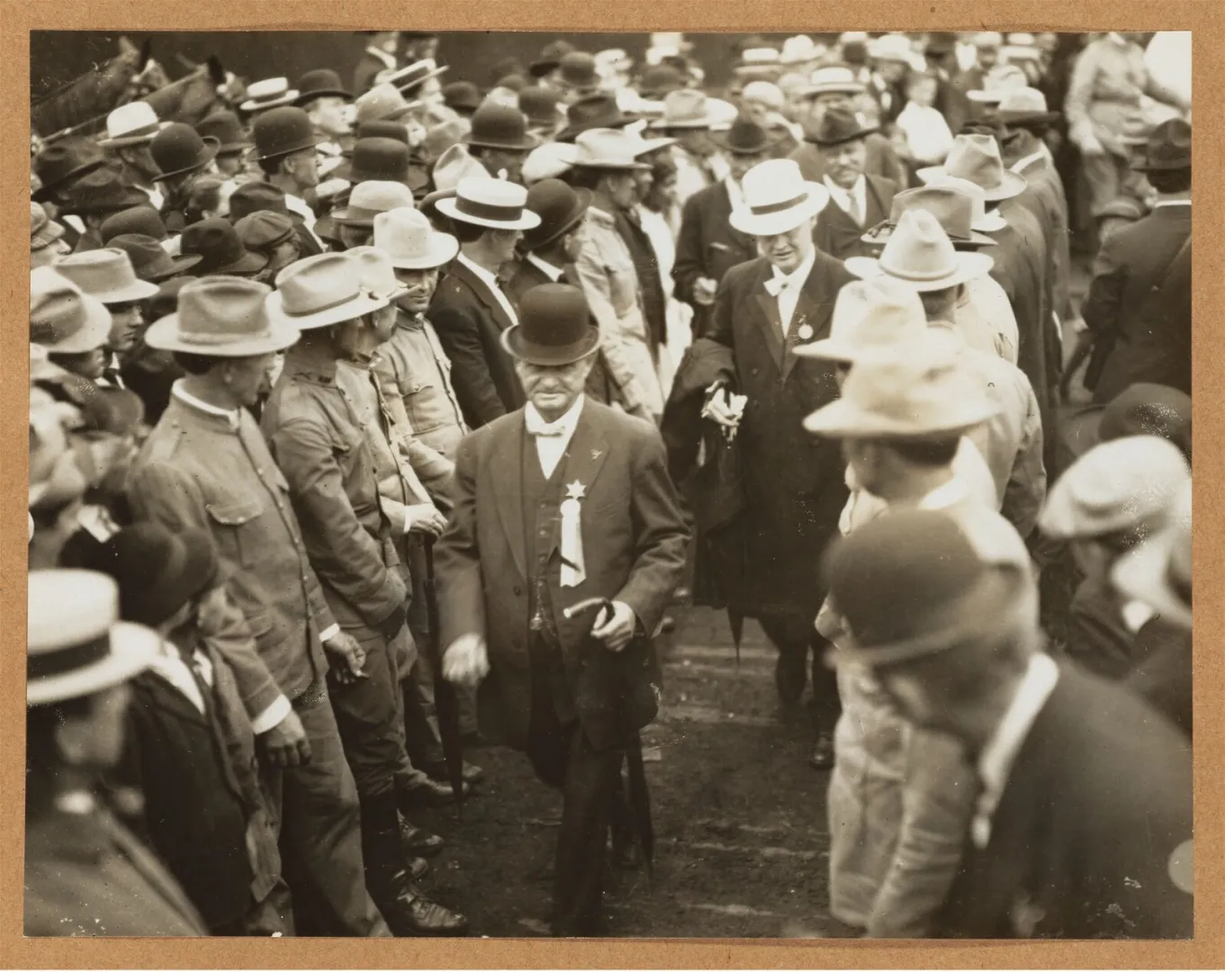 Kansas Governor Walter Stubbs leads a crowd of men in a reception for Theodore Roosevelt at Osawatomie, Kansas, in 1910