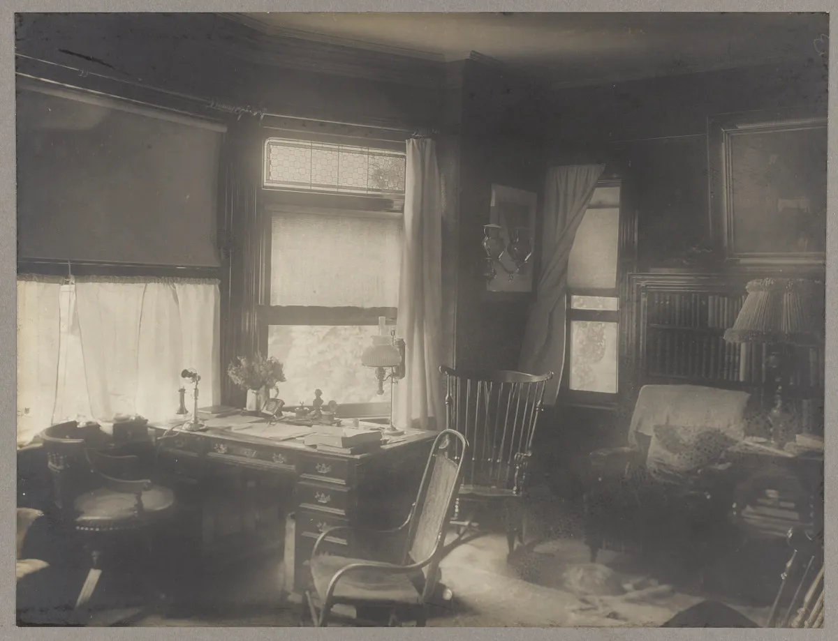 Interior of Theodore Roosevelt’s study at Sagamore Hill with desk, chair, and window