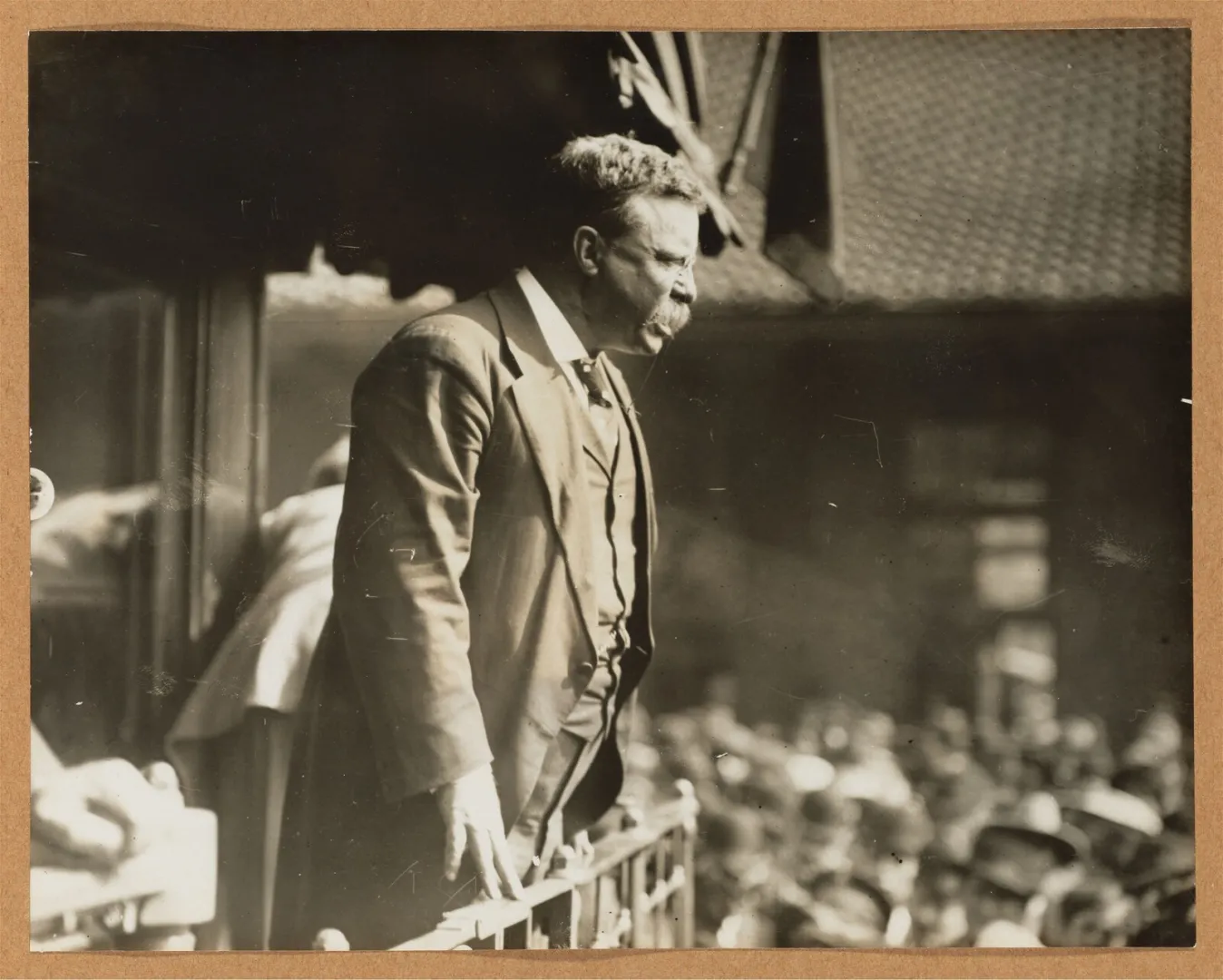 Theodore Roosevelt speaks forcefully, gesturing to a crowd, during his 1910 tour in Indiana