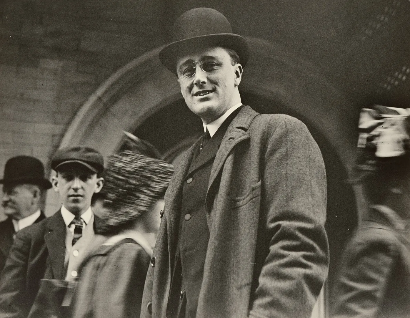 Young Franklin D. Roosevelt in a bowler hat and eyeglasses, 1912