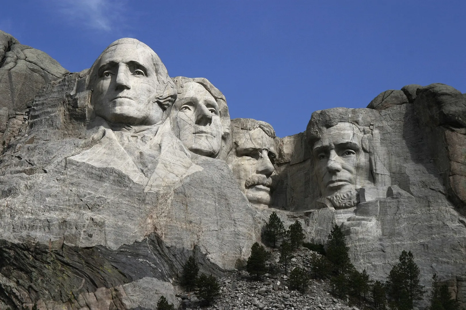 Mount Rushmore National Memorial with the carved faces of Washington, Jefferson, Roosevelt, and Lincoln