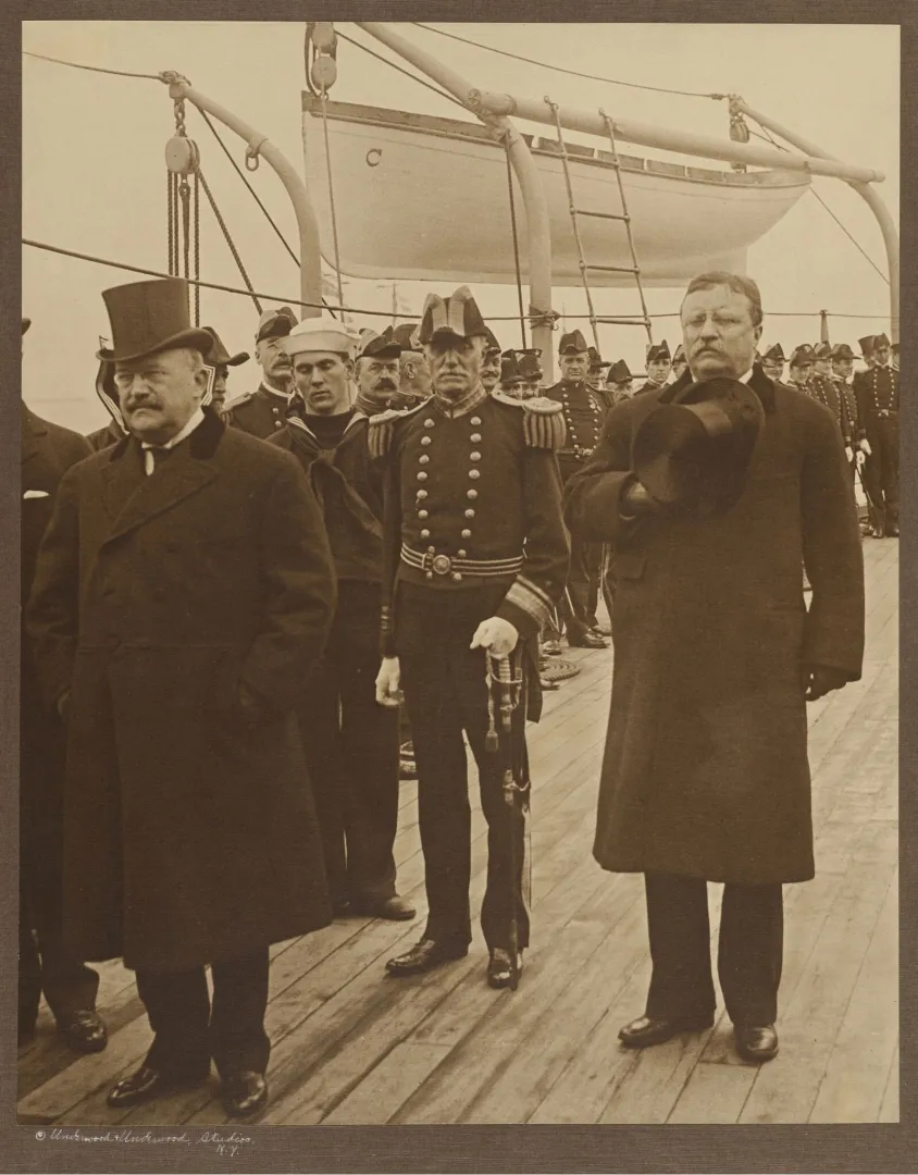 President Roosevelt on deck with officials greeting the returning fleet