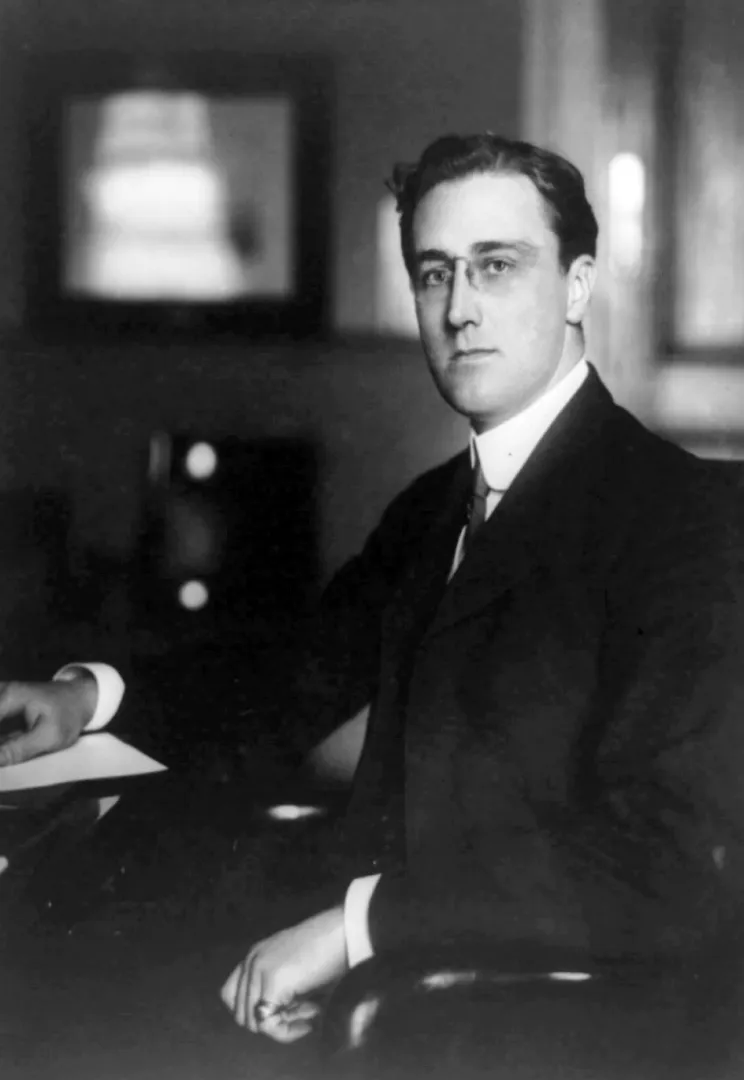 Young Franklin D. Roosevelt seated as Assistant Secretary of the Navy, 1913