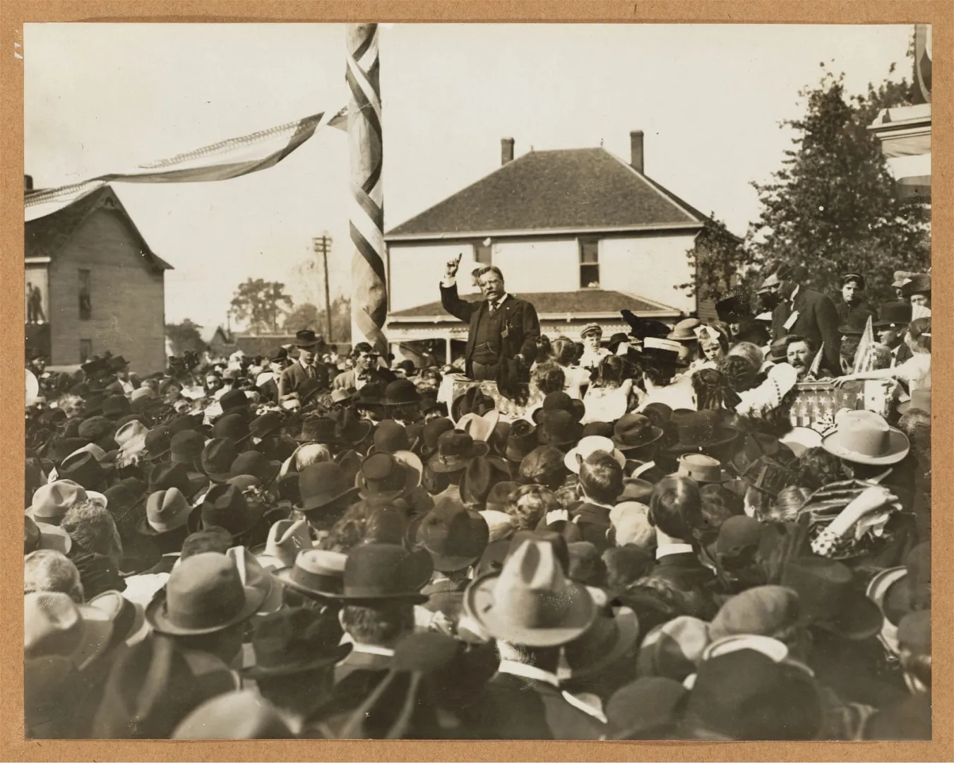 Theodore Roosevelt addressing a large outdoor crowd at Hornell, New York, 1910
