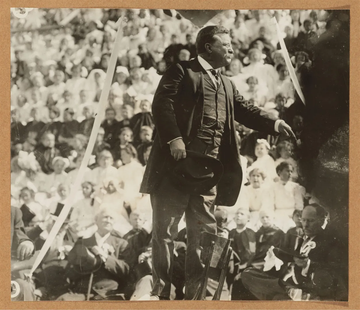 Theodore Roosevelt gesturing to a dense crowd at Hot Springs, Arkansas, 1910