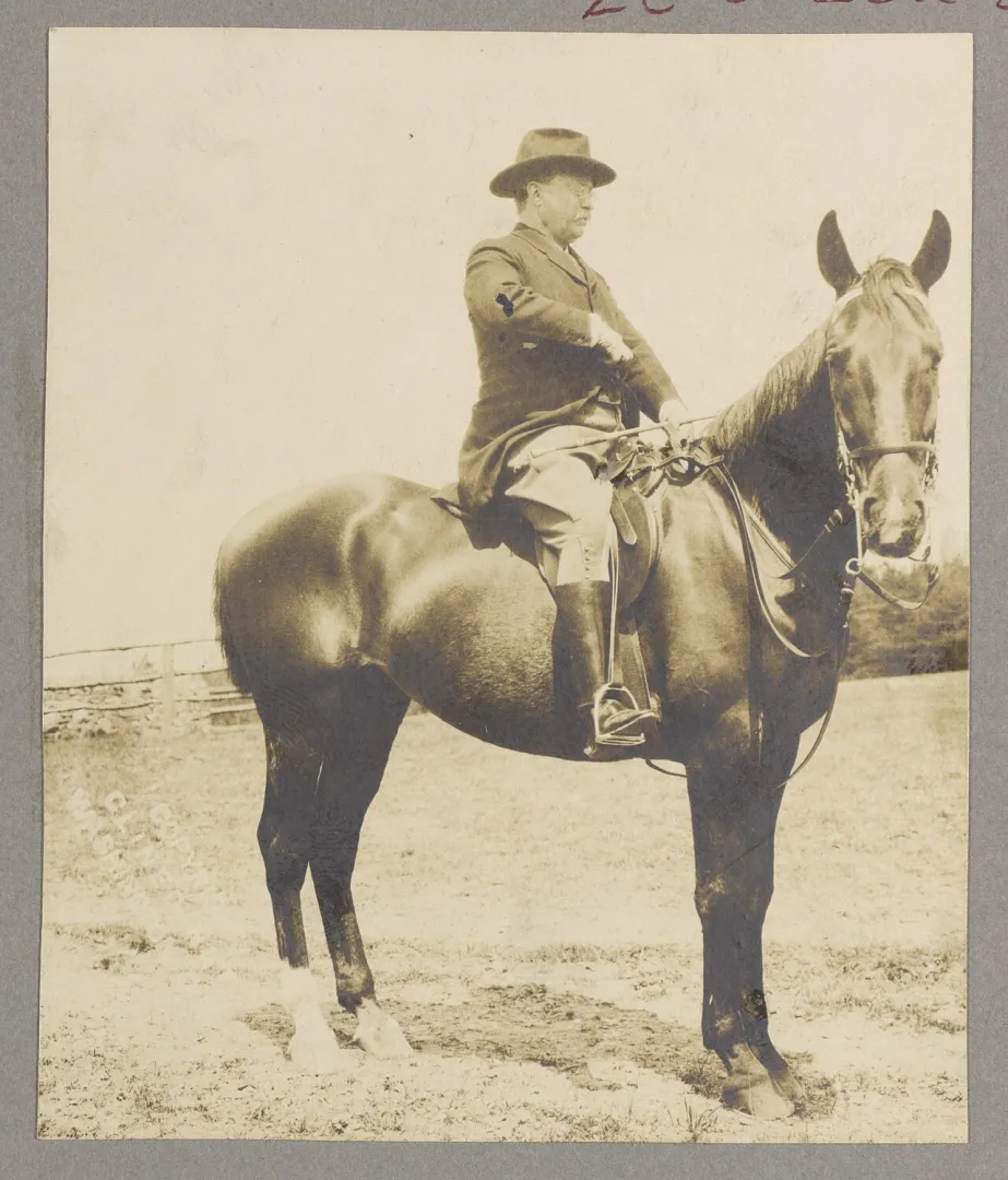 Theodore Roosevelt mounted on horseback outdoors