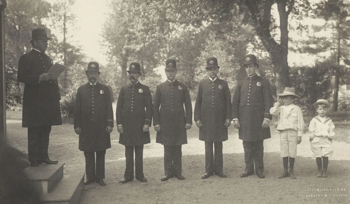 Young Archie and Quentin Roosevelt with a White House policeman, 1902