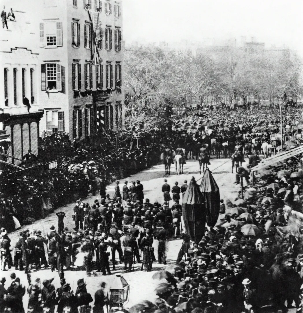 Lincoln's funeral procession passing the Roosevelt mansion at Union Square, 1865