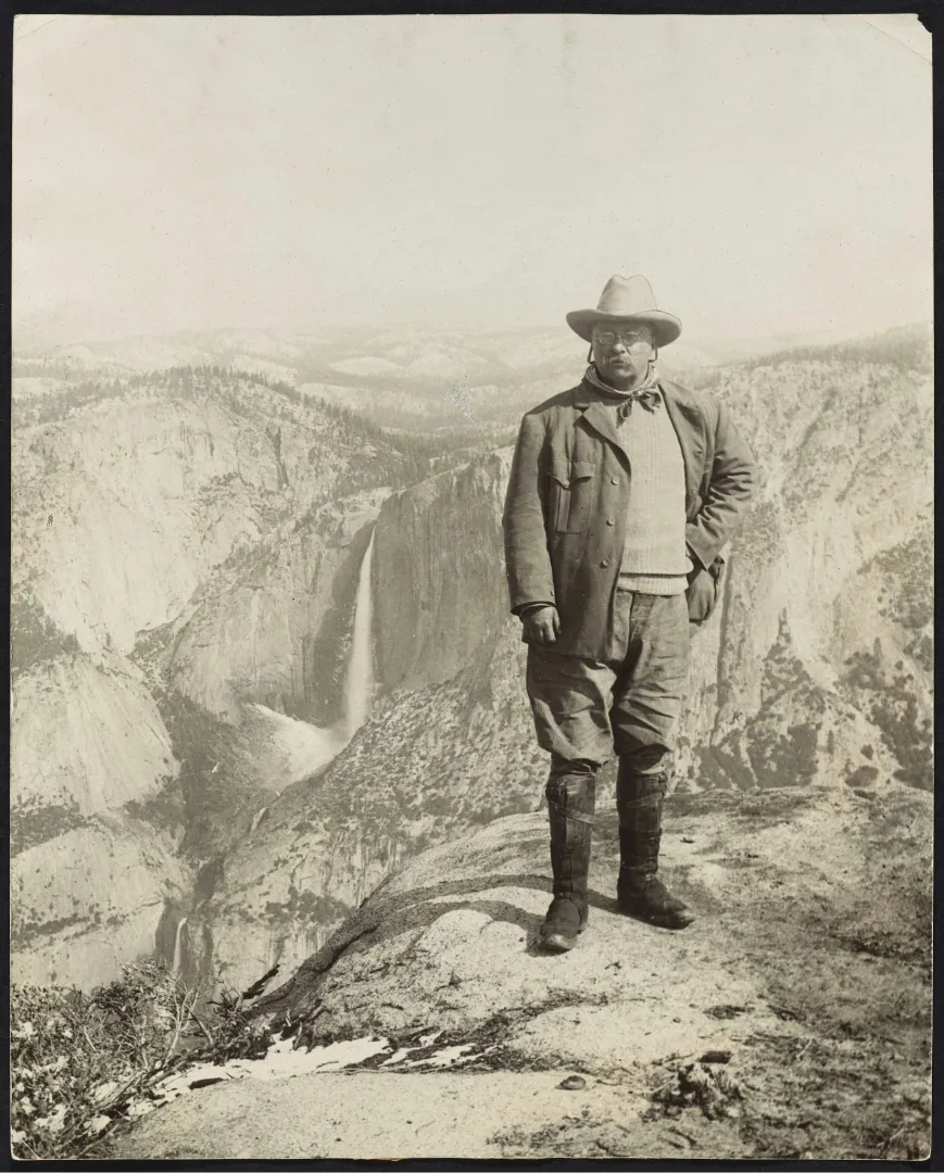 President Theodore Roosevelt standing on Glacier Point above Yosemite Valley