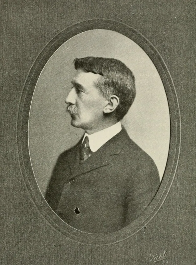 Oval portrait of naturalist and editor George Bird Grinnell.