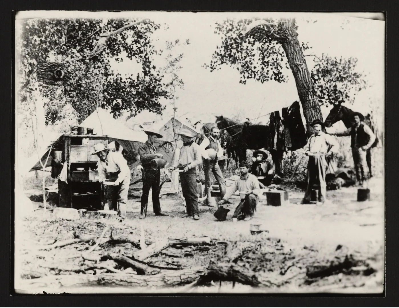 Cowboys gathered at a Badlands camp