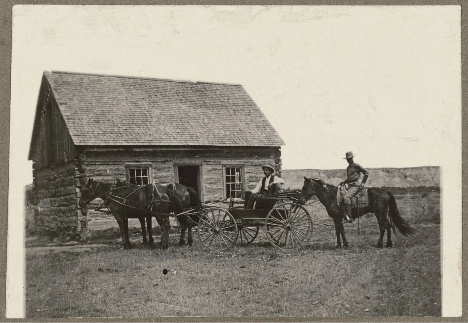 The Maltese Cross Ranch cabin with a horse and buggy, Dakota Badlands
