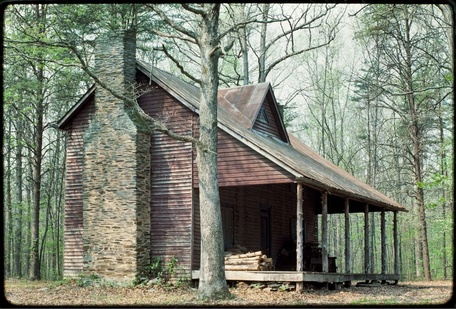 Exterior of Theodore Roosevelt's board-and-batten Pine Knot cottage seen from the northeast corner