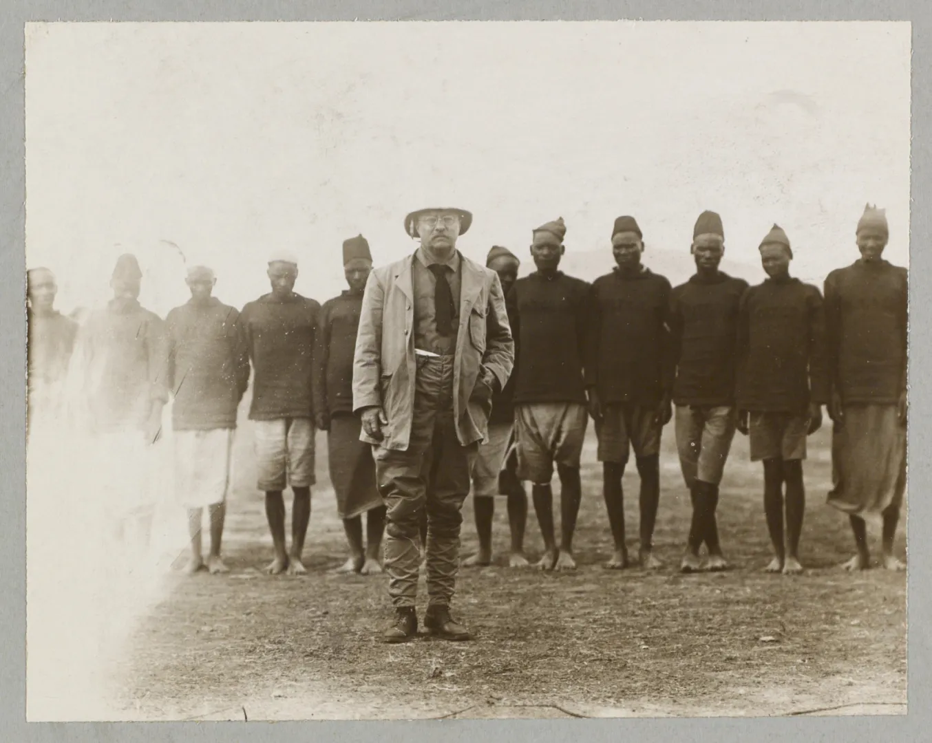 Theodore Roosevelt standing with members of his expedition caravan in Africa