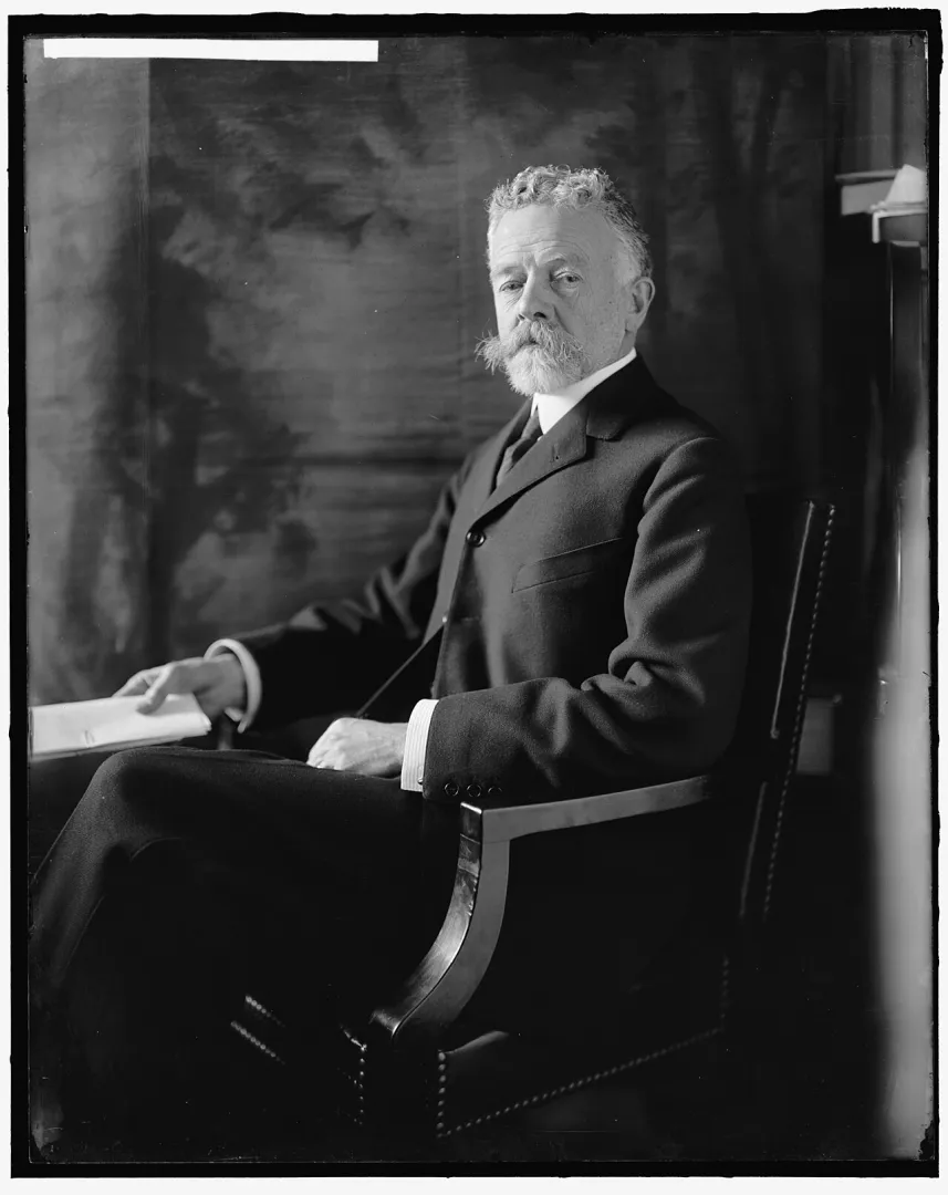 Henry Cabot Lodge seated, as U.S. Senator from Massachusetts