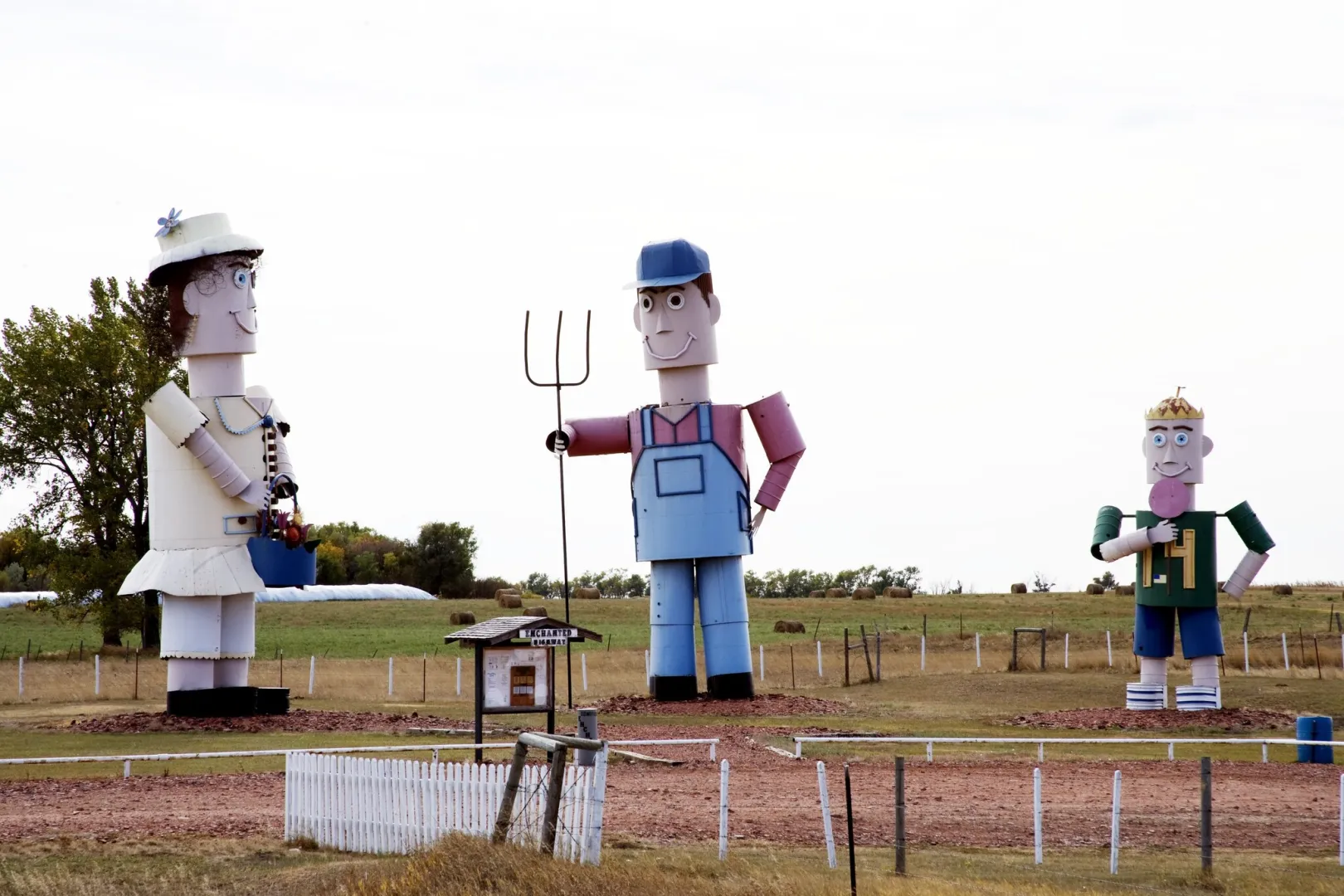 The Tin Family, the first of Gary Greff’s scrap metal sculptures, standing in a field on the Enchanted Highway