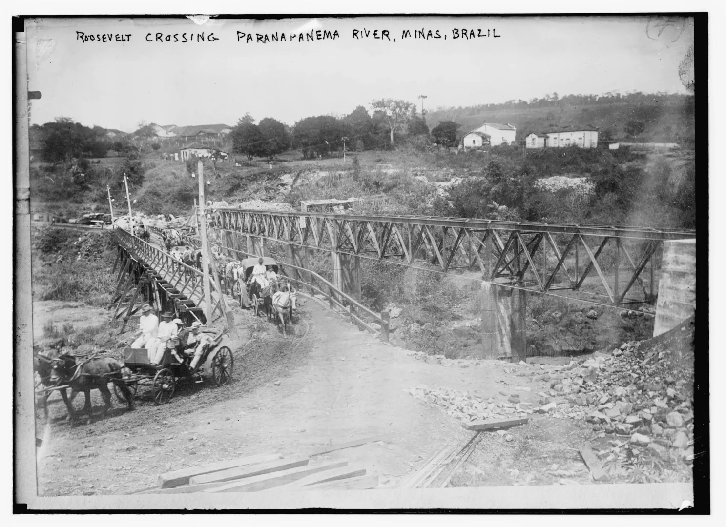 The expedition crossing a river bridge in the Brazilian interior