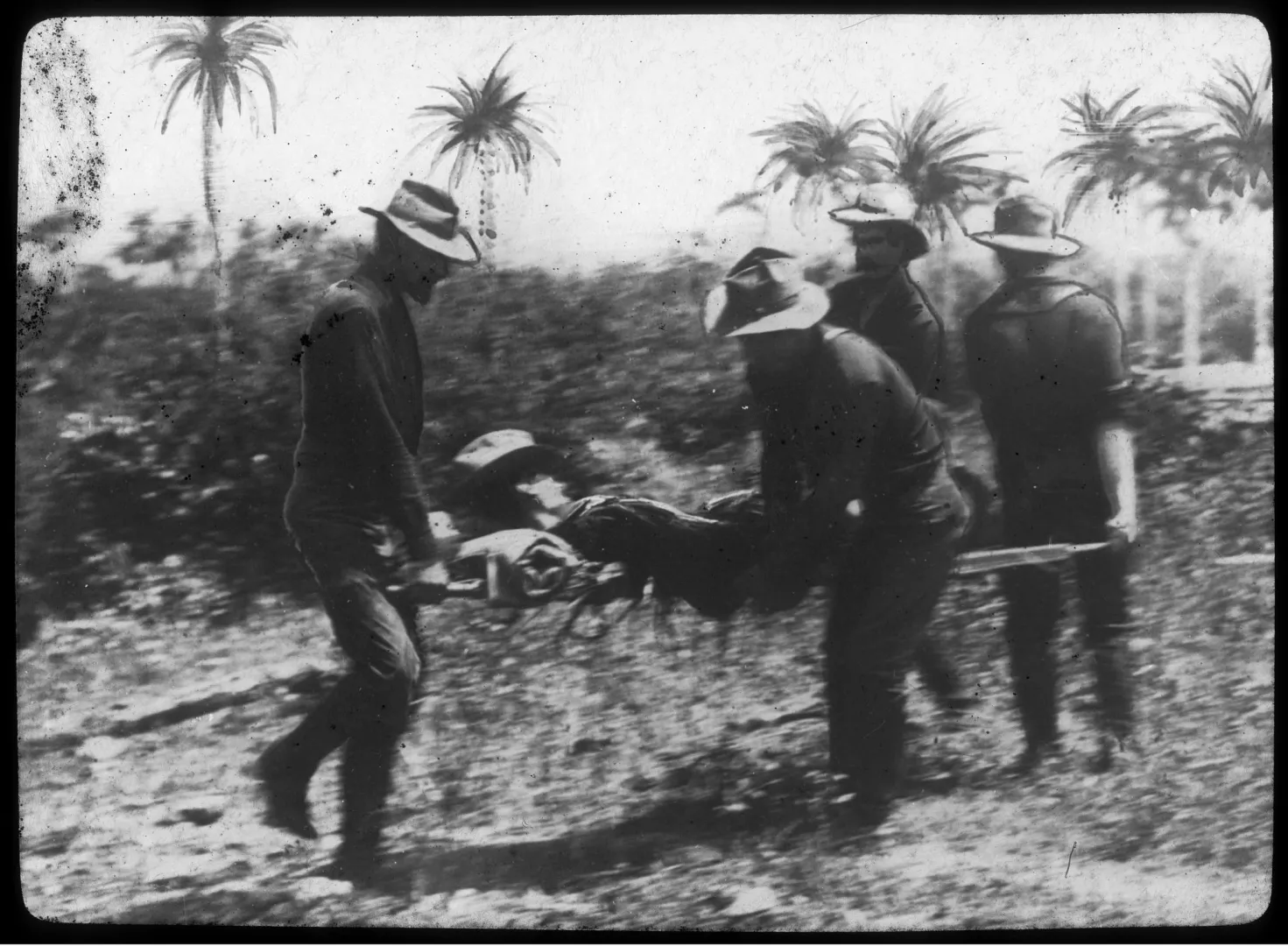 Rough Riders carrying a wounded comrade after the fight at Las Guasimas