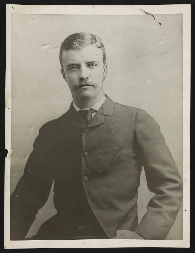Standing studio portrait of a young Theodore Roosevelt in 1884