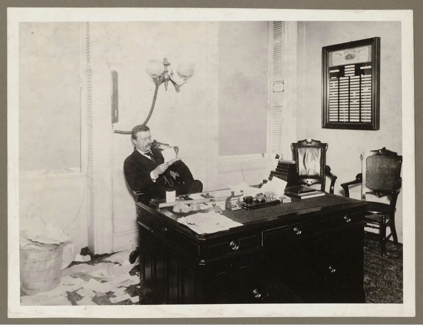 Theodore Roosevelt at his desk as New York City Police Commissioner
