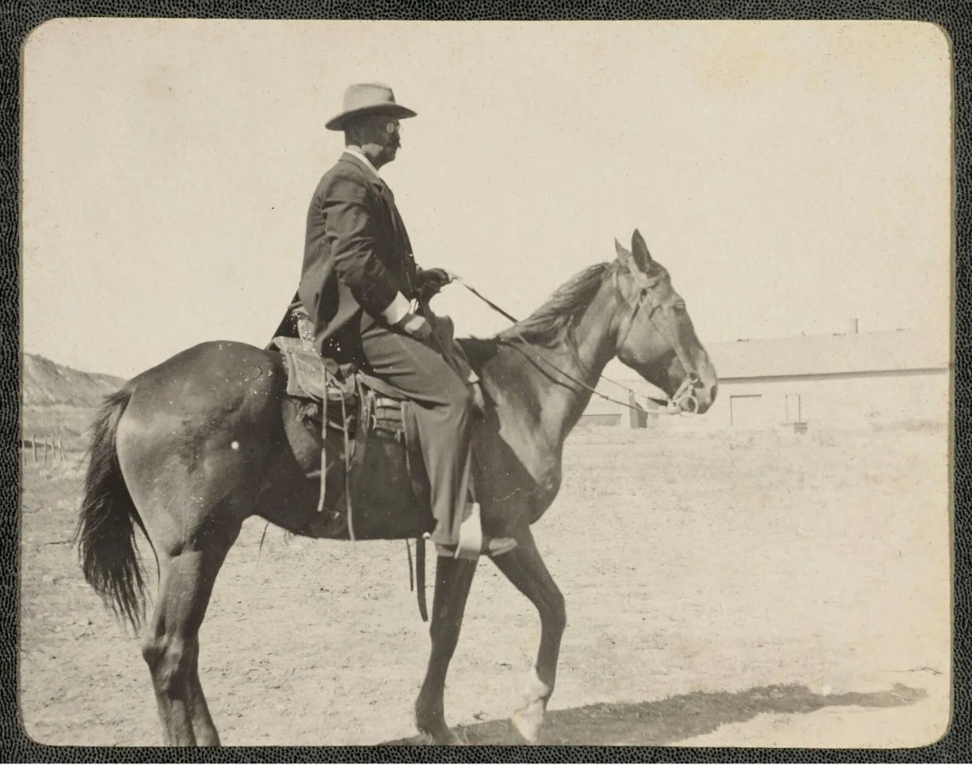 Theodore Roosevelt on horseback in riding attire
