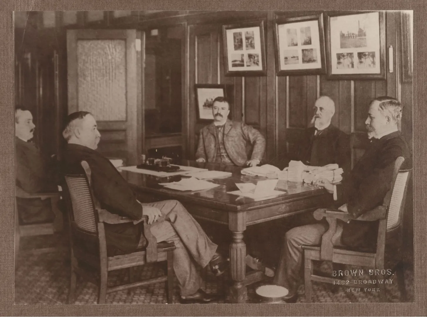 The New York City Board of Police Commissioners seated in conference, with Roosevelt