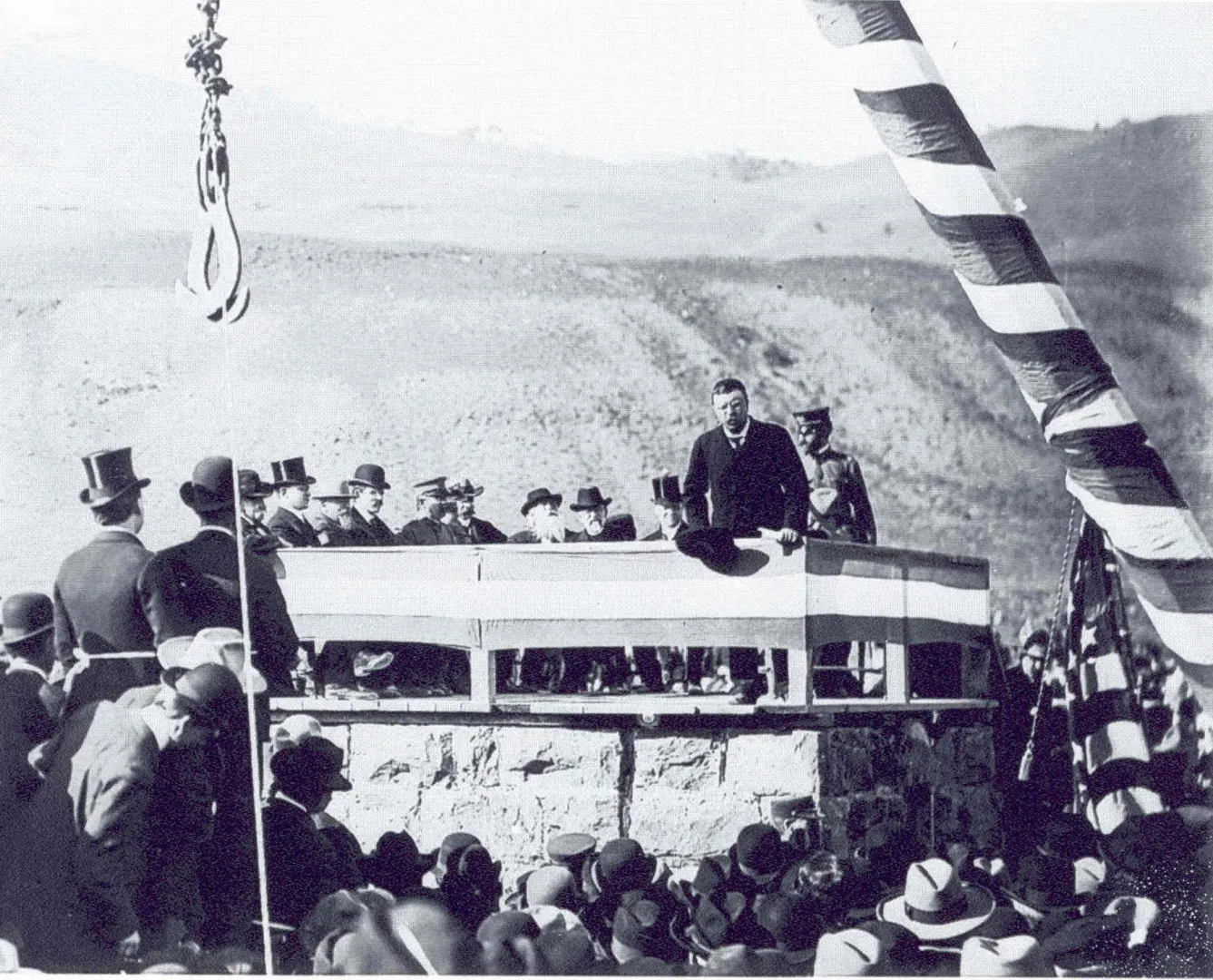 Theodore Roosevelt speaking to a crowd at the cornerstone ceremony for the Roosevelt Arch at Yellowstone, 1903