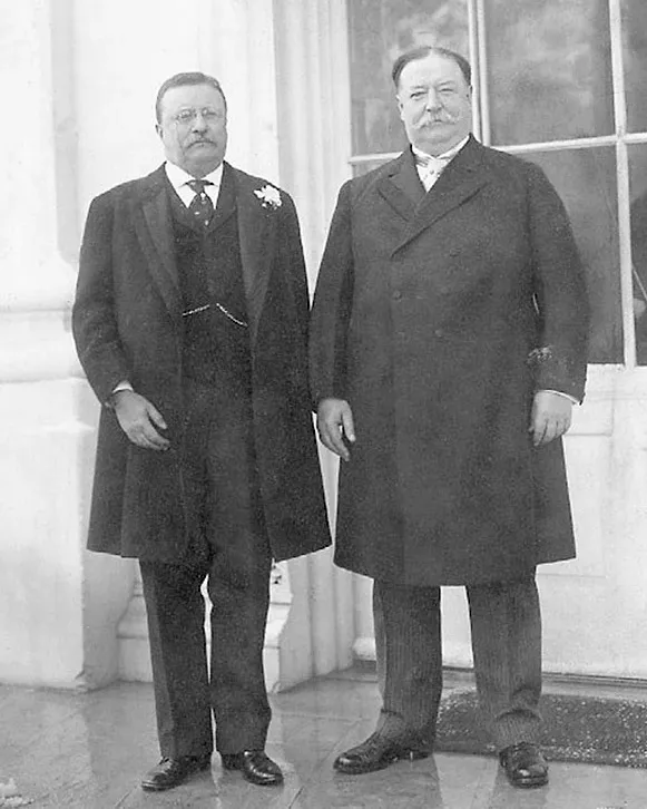 Theodore Roosevelt and William Howard Taft standing together at the White House, 1909