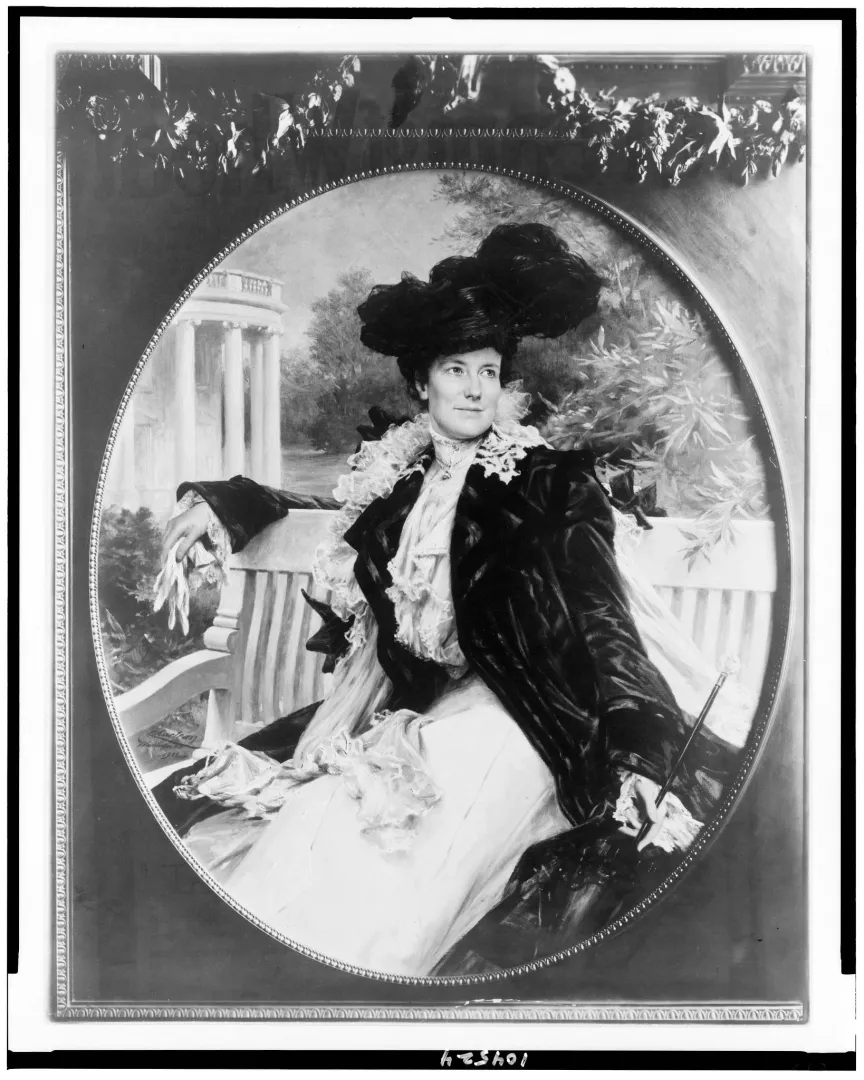 Formal three-quarter portrait of Edith Kermit Roosevelt in a dark gown and wide-brimmed hat