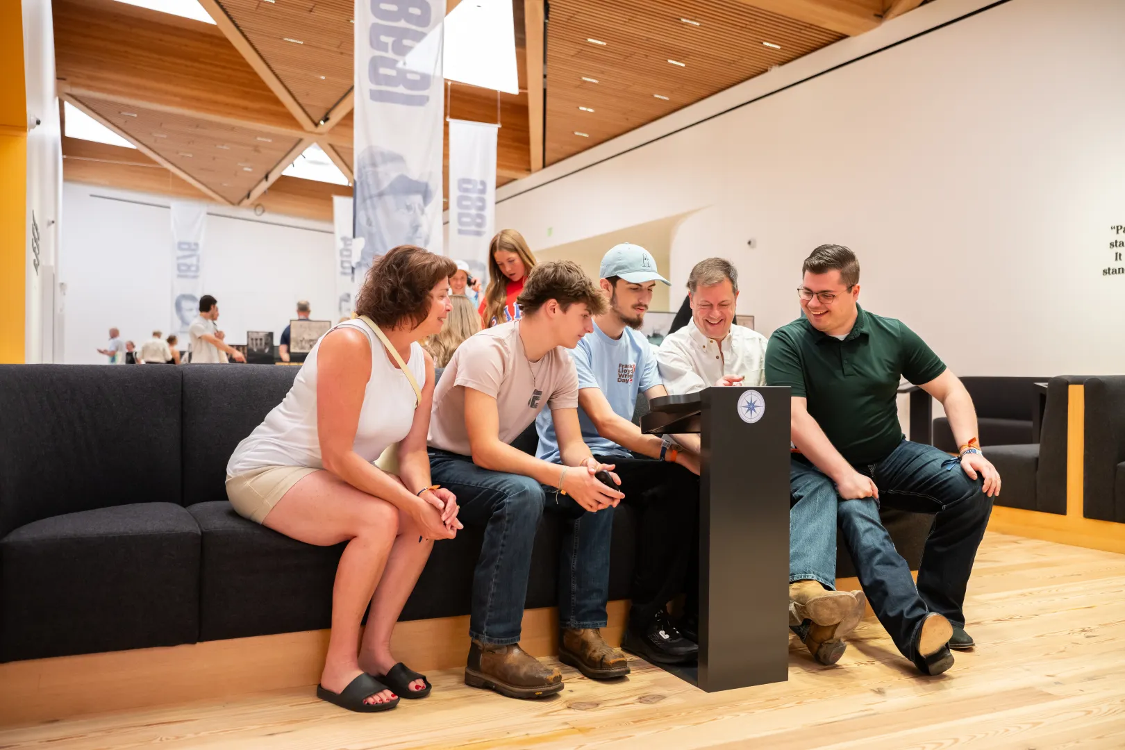 A group of participants enjoying a Trailblazer station in the Permanent Exhibit