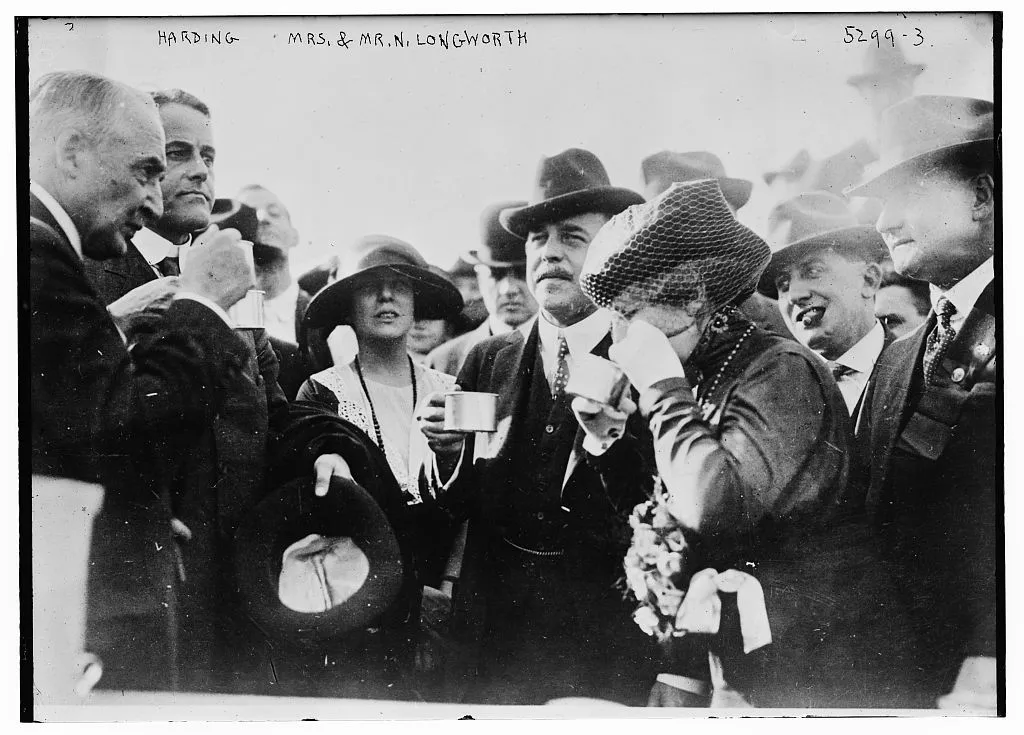 Nicholas and Alice Longworth with Warren G. Harding.