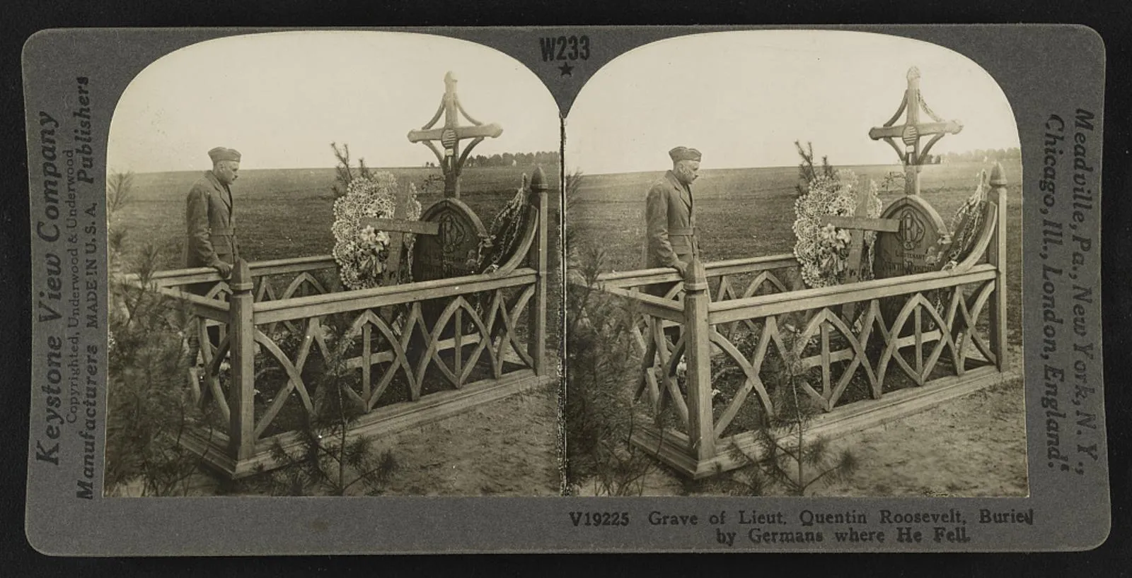 The wartime grave of Lieutenant Quentin Roosevelt in France, marked by a cross and part of his airplane